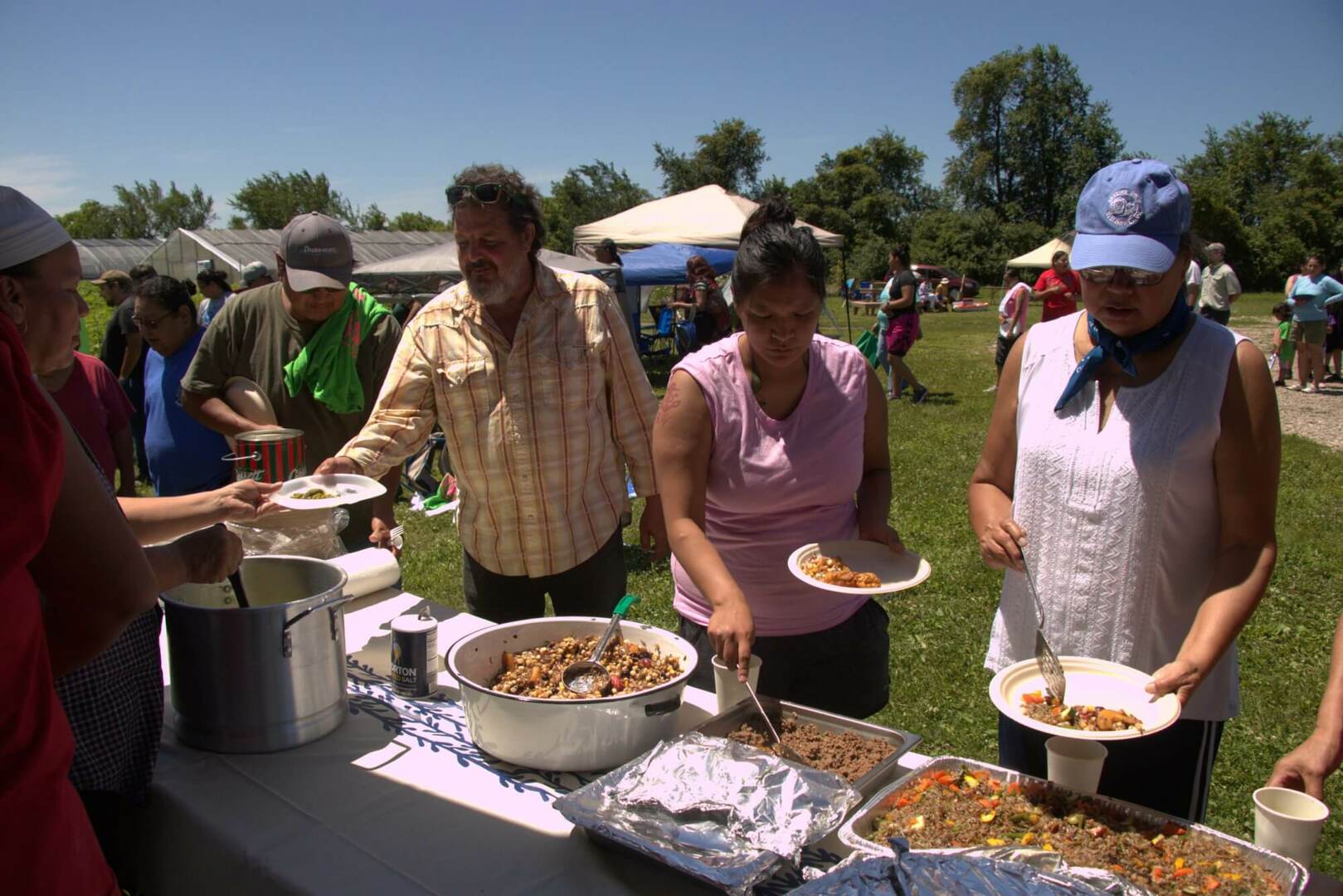 People receiving a meal as part of the Meskwaki Food Sovereignty initiative