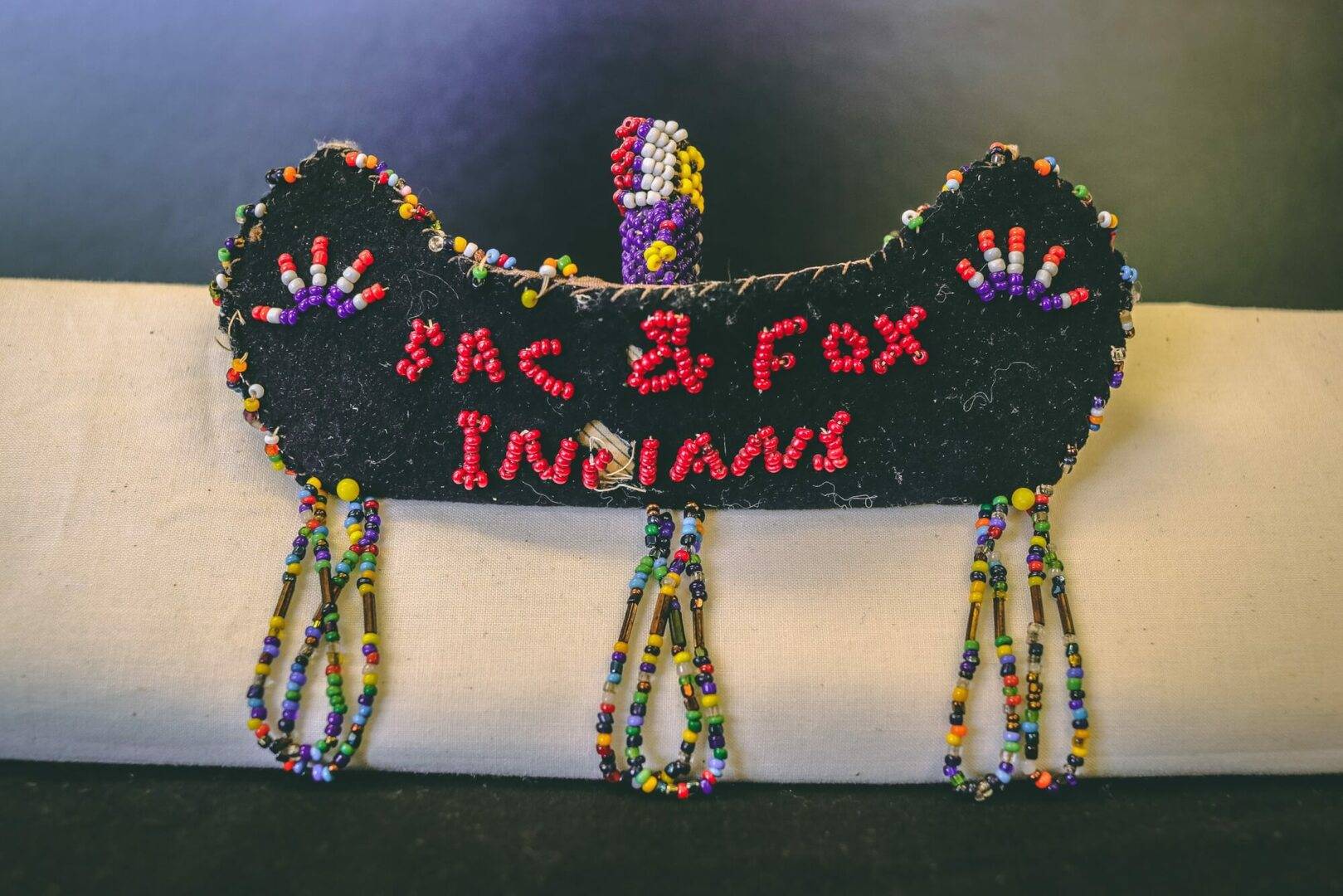 Beaded Canoe Ornament That Reads Sac & Fox Indians